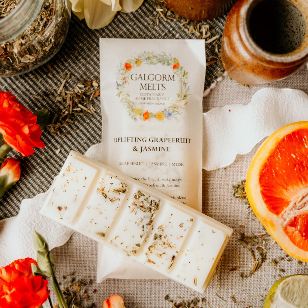 Experience the bright, zesty notes of Uplifting Grapefruit &amp; Jasmine. Refreshing lemon balm infuses this blend, combining the vibrant aromas of freshly peeled grapefruit, pomelo, and mandarins with the delicate sweetness of jasmine.